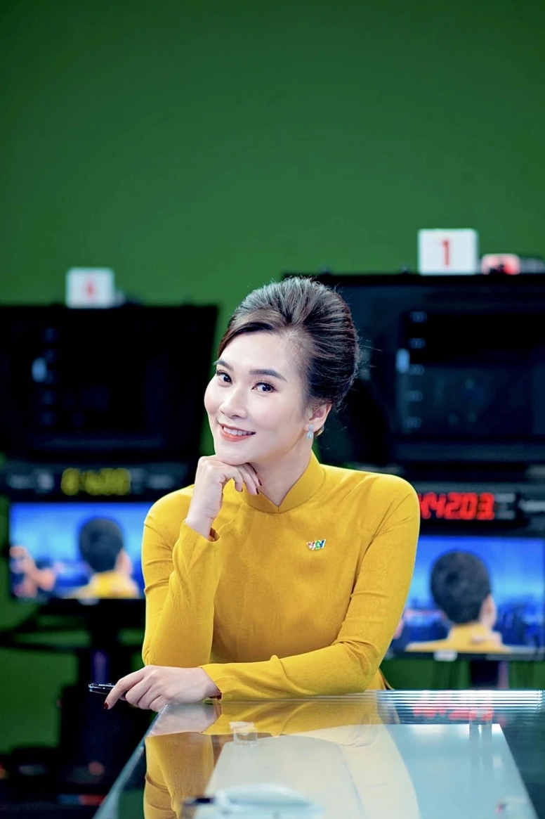 BTV Khánh Trang với nụ cười tươi tắn.