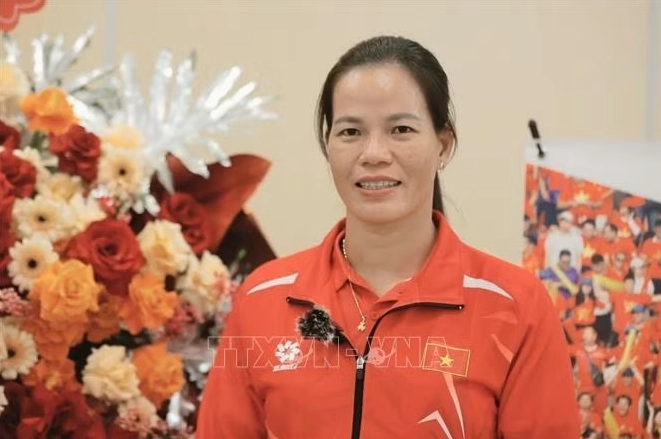 Phạm Thị Huệ trong một hoạt động công tác